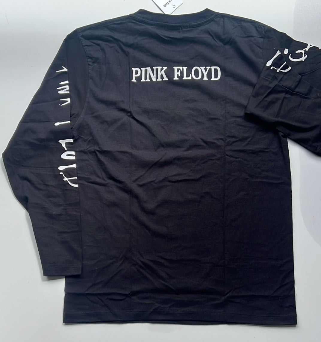 Black long sleeve Rebelchords shirt featuring Pink Floyd Dark Side of the Moon album design with white text on back and sleeves
