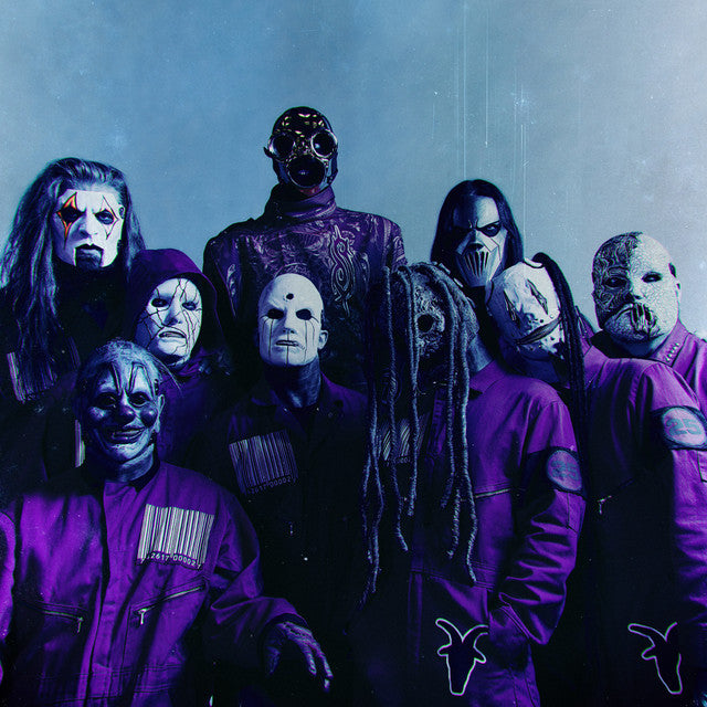 Slipknot band members wearing iconic masks and jumpsuits in a dark setting buy Slipknot t-shirts online