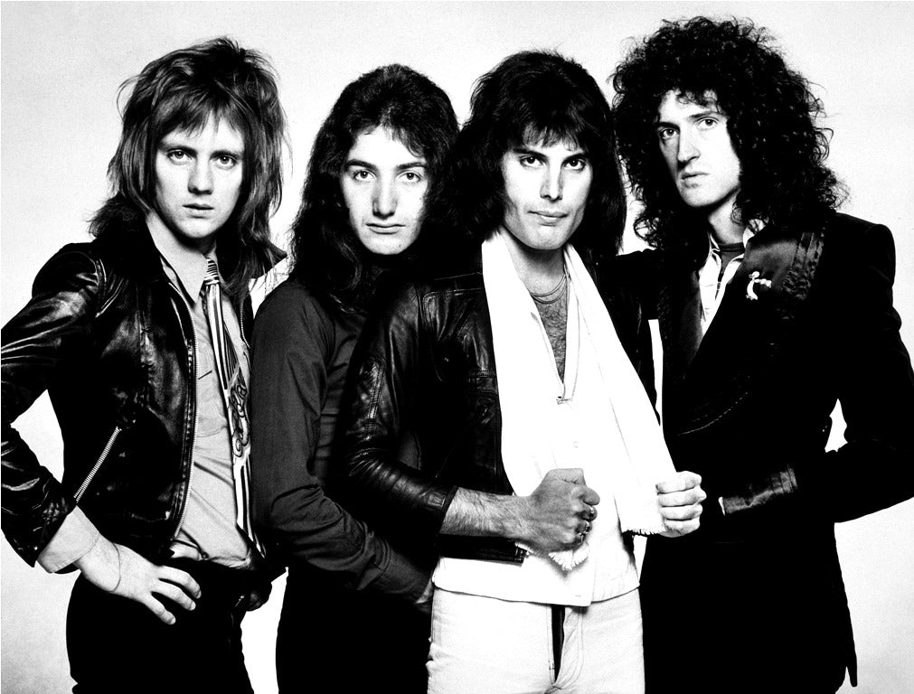 Classic black and white photo of Queen band members for fans to buy Queen T-shirts online