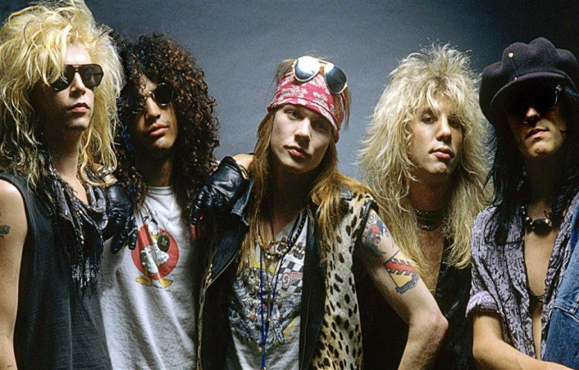 Classic photo of Guns N' Roses band members promoting Guns N' Roses band t-shirts collection
